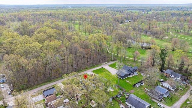bird's eye view featuring a forest view