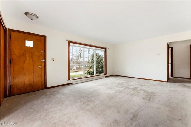 449 W Long Lake Blvd, Akron, OH 44319 - interior space featuring baseboards, baseboard heating, and light carpet