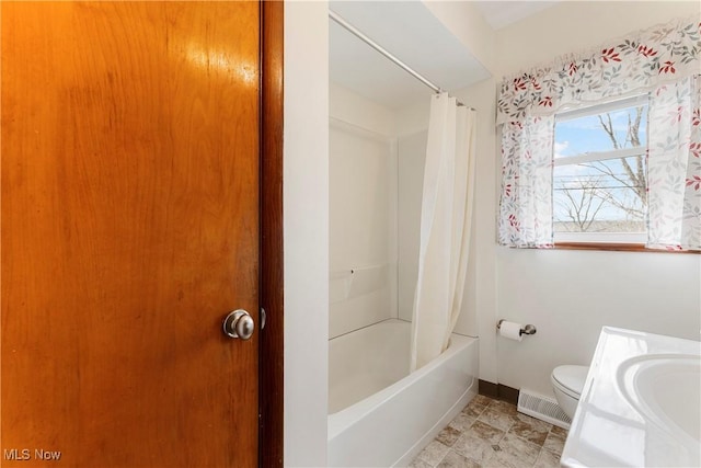 449 W Long Lake Blvd, Akron, OH 44319 - bathroom with visible vents, a sink, baseboards, toilet, and shower / tub combo with curtain