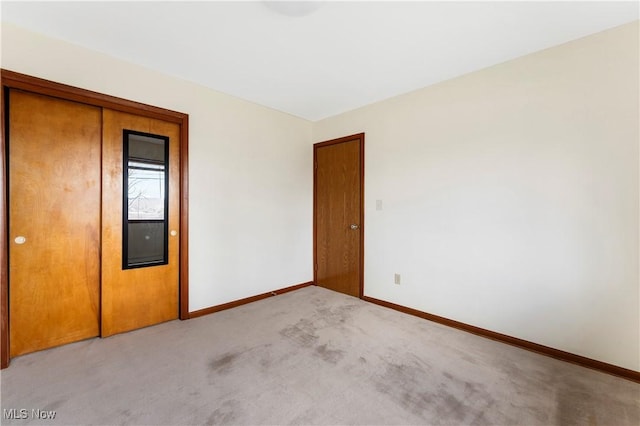 449 W Long Lake Blvd, Akron, OH 44319 - unfurnished room featuring baseboards and light carpet