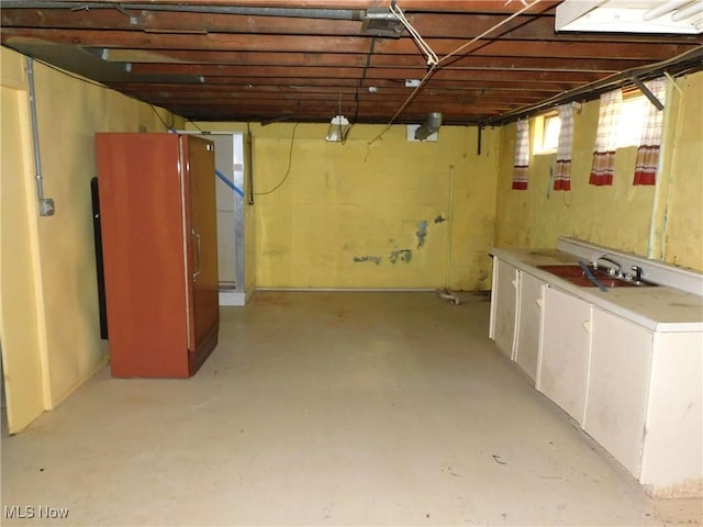 below grade area featuring a sink