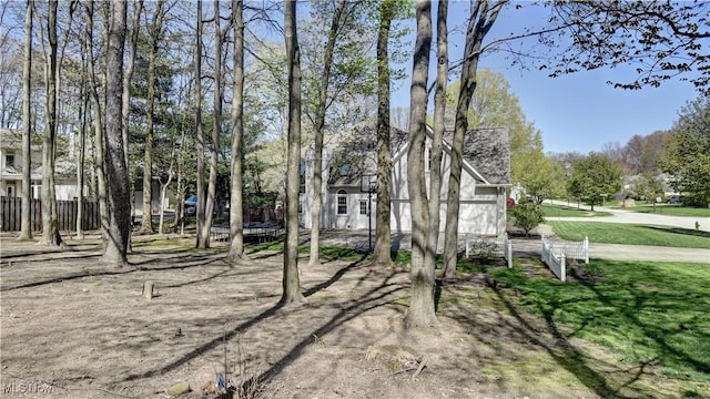 view of yard featuring fence