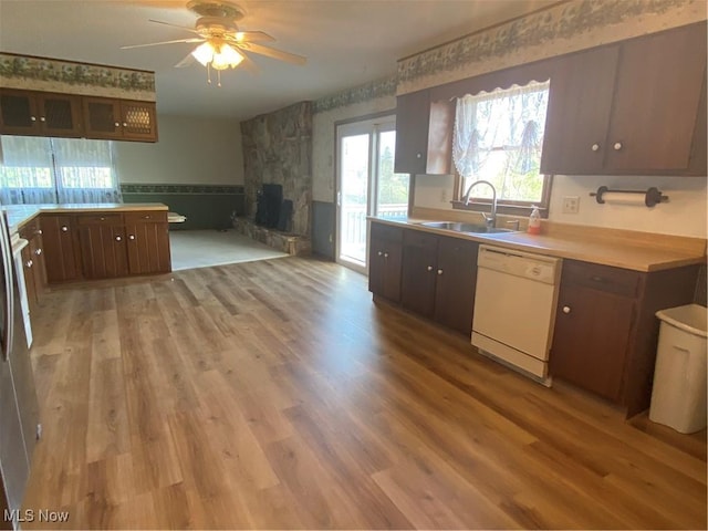 8995 Sarbaugh Rd, Norwich, OH 43767 - kitchen with white dishwasher, a ceiling fan, plenty of natural light, and a sink