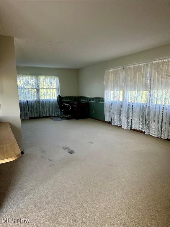 8995 Sarbaugh Rd, Norwich, OH 43767 - view of carpeted spare room