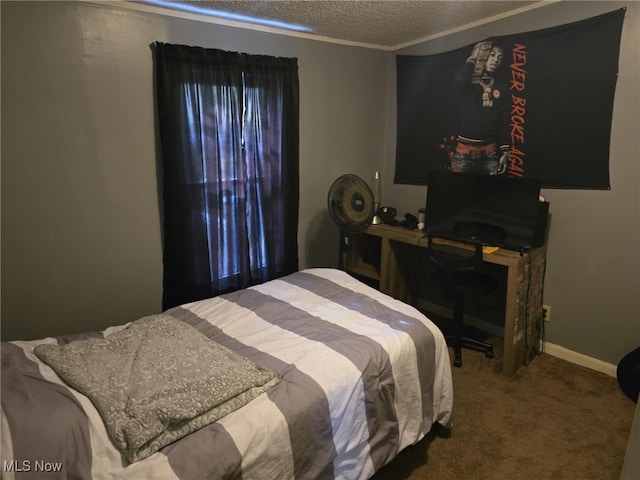 carpeted bedroom featuring a textured ceiling