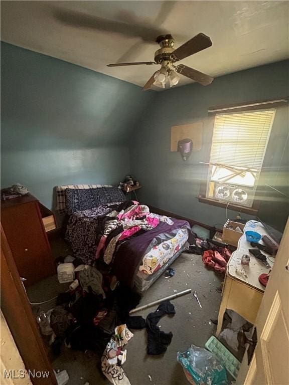 bedroom with a ceiling fan and vaulted ceiling