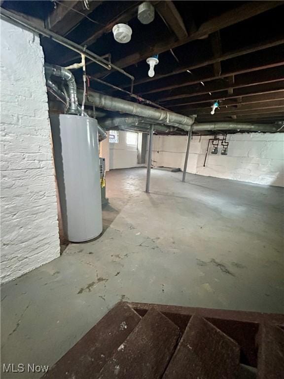 below grade area featuring gas water heater