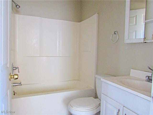 full bath with toilet, shower / bathing tub combination, and vanity