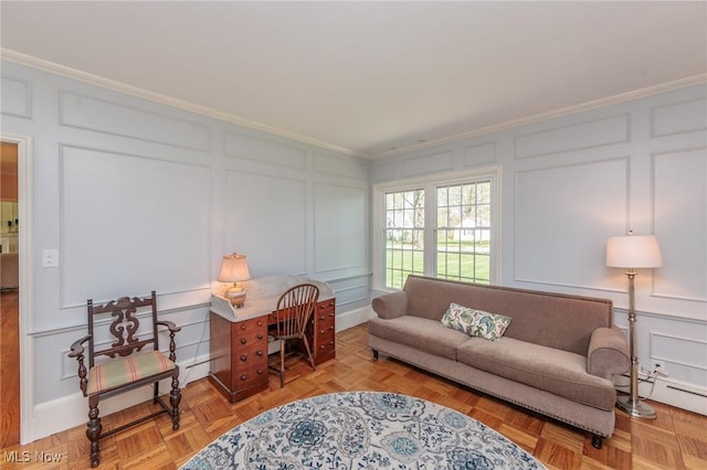living area featuring crown molding, a baseboard radiator, and a decorative wall