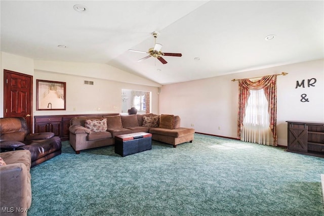 living room featuring carpet floors, ceiling fan, lofted ceiling, and visible vents