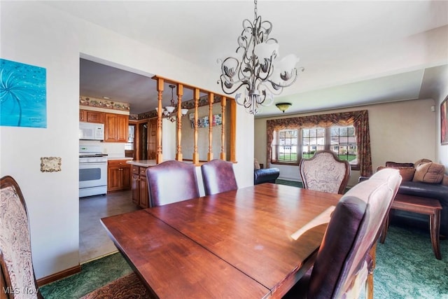 dining room featuring a chandelier