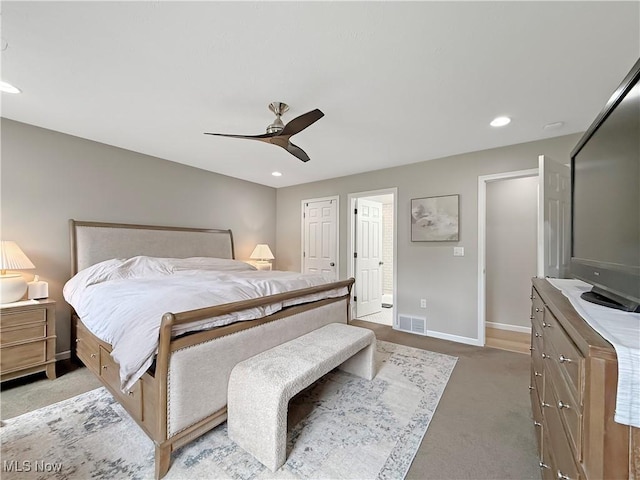 carpeted bedroom with recessed lighting, baseboards, visible vents, and ceiling fan