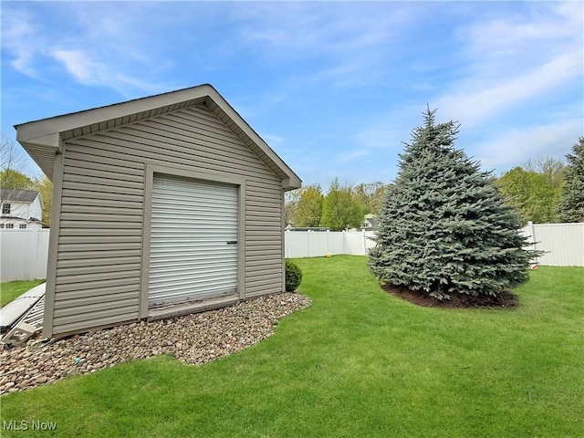view of shed featuring a fenced backyard