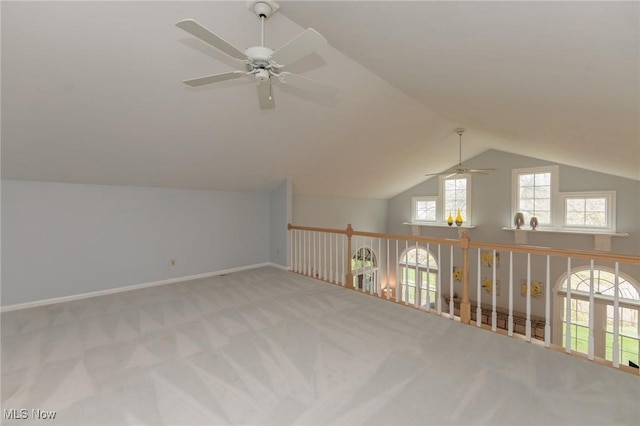 117 Royal Oak Dr, Aurora, OH 44202 - additional living space with a ceiling fan, baseboards, lofted ceiling, and carpet