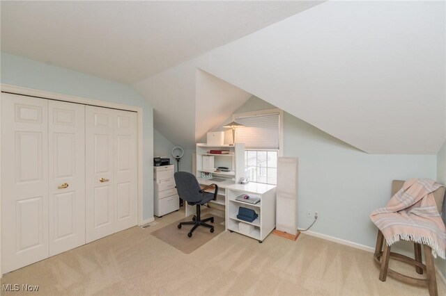 117 Royal Oak Dr, Aurora, OH 44202 - home office featuring baseboards, light carpet, and lofted ceiling