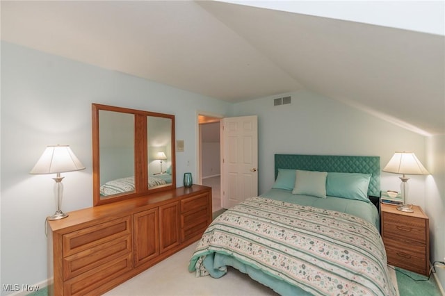 117 Royal Oak Dr, Aurora, OH 44202 - bedroom with light colored carpet, lofted ceiling, and visible vents
