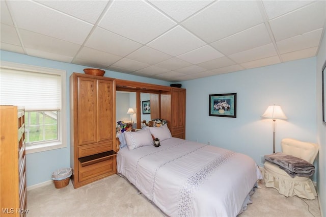 117 Royal Oak Dr, Aurora, OH 44202 - bedroom featuring a paneled ceiling and light carpet