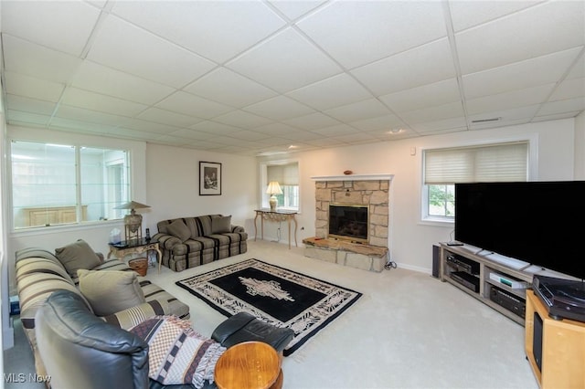 117 Royal Oak Dr, Aurora, OH 44202 - carpeted living room featuring a fireplace and a paneled ceiling