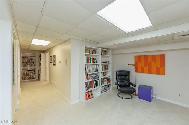 117 Royal Oak Dr, Aurora, OH 44202 - living area featuring baseboards, visible vents, a paneled ceiling, and carpet