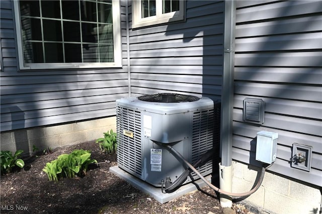 exterior details featuring central AC