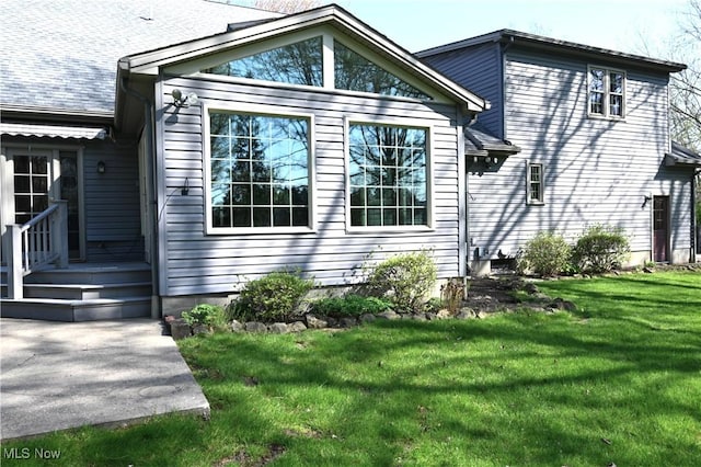 exterior space featuring a yard