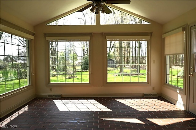 unfurnished sunroom featuring visible vents and a wealth of natural light