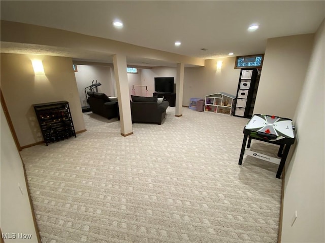 interior space featuring recessed lighting and baseboards