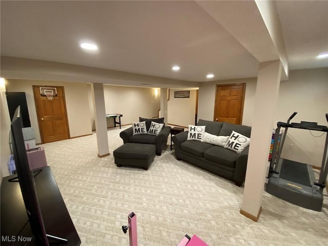 carpeted living room featuring recessed lighting