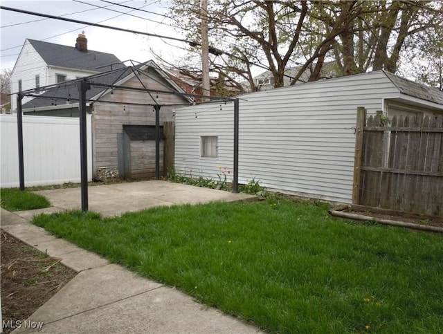 view of yard with a patio and a fenced backyard