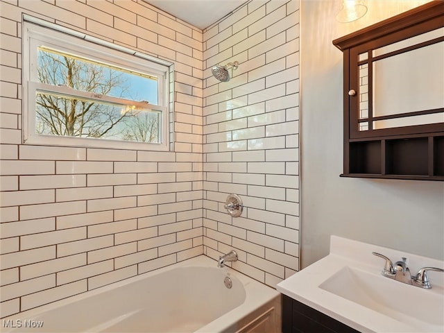 bathroom with vanity and shower / washtub combination
