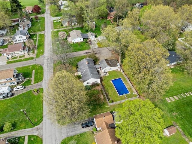birds eye view of property with a residential view