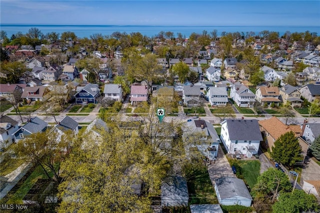 birds eye view of property with a residential view