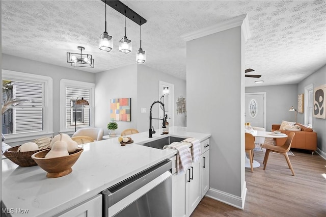 4394 W 139th St, Cleveland, OH 44135 - kitchen with white cabinets, a sink, baseboards, stainless steel dishwasher, and dark wood-style floors