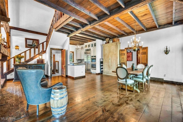 dining room with wooden ceiling, beamed ceiling, dark wood-style floors, an inviting chandelier, and stairs