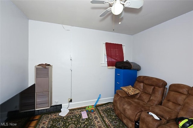 living room featuring ceiling fan