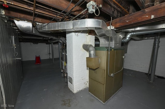 unfinished basement with heating unit and water heater