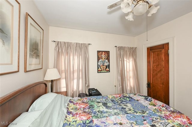 bedroom featuring ceiling fan