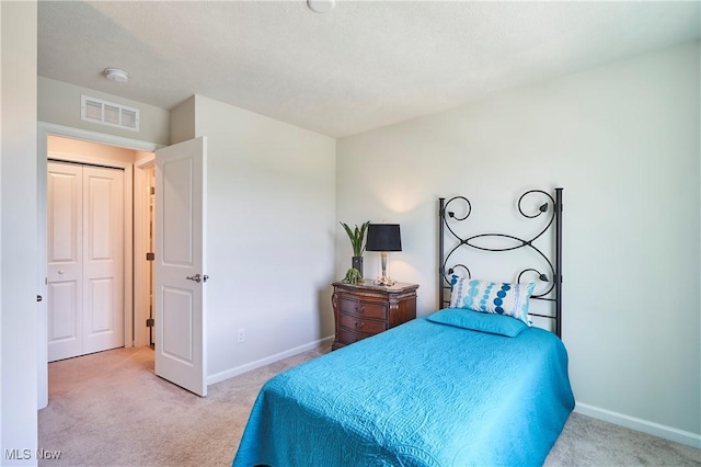 1662 N Eckert Ln, Akron, OH 44313 - bedroom featuring baseboards, carpet flooring, and visible vents