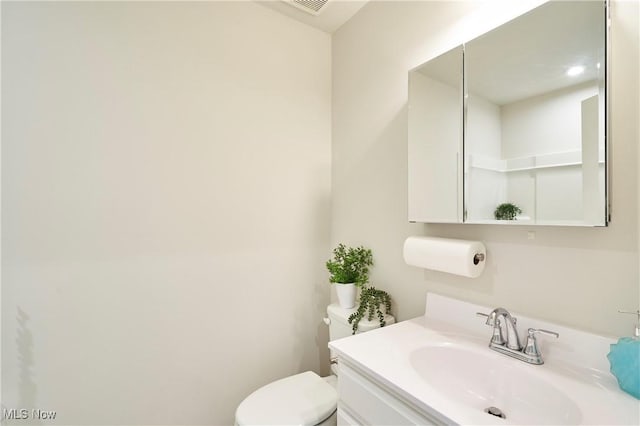 1662 N Eckert Ln, Akron, OH 44313 - half bathroom featuring toilet and vanity