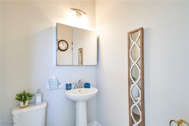 1662 N Eckert Ln, Akron, OH 44313 - bathroom featuring a sink and toilet