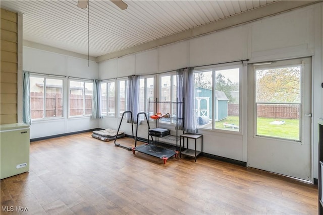 sunroom / solarium with wood finished floors