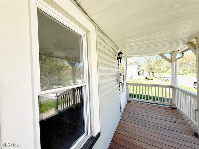 wooden deck featuring a porch
