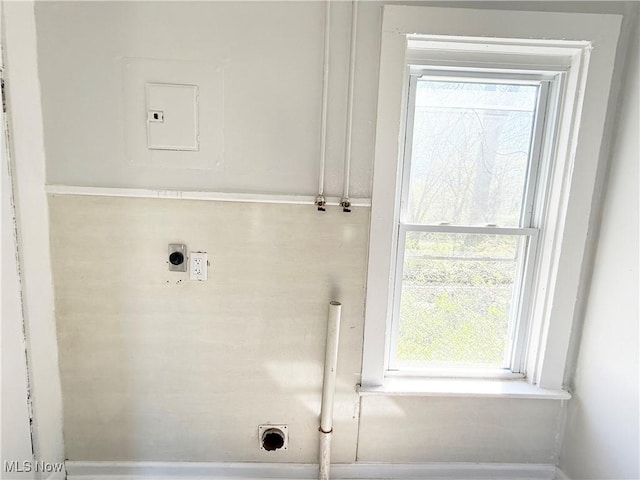 washroom featuring electric dryer hookup, plenty of natural light, and laundry area