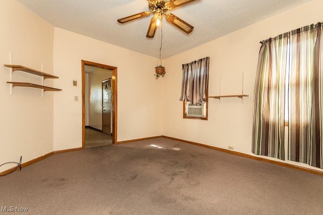 unfurnished room featuring carpet floors, baseboards, ceiling fan, and cooling unit