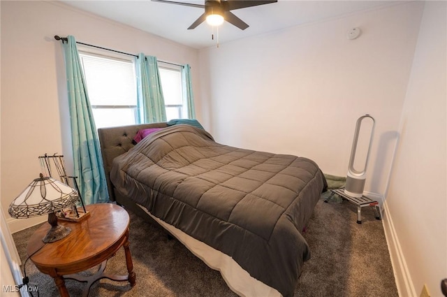 carpeted bedroom with baseboards and ceiling fan