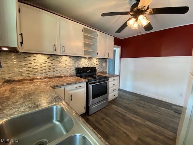 kitchen with a sink, white cabinets, electric range, and ceiling fan