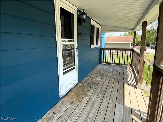 wooden deck featuring a porch
