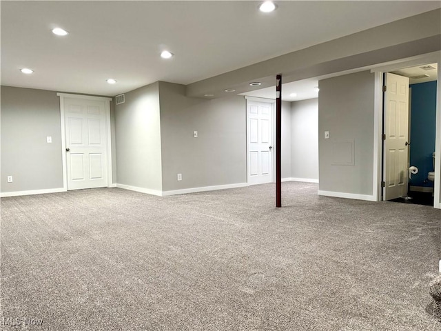 finished basement with recessed lighting, baseboards, visible vents, and carpet