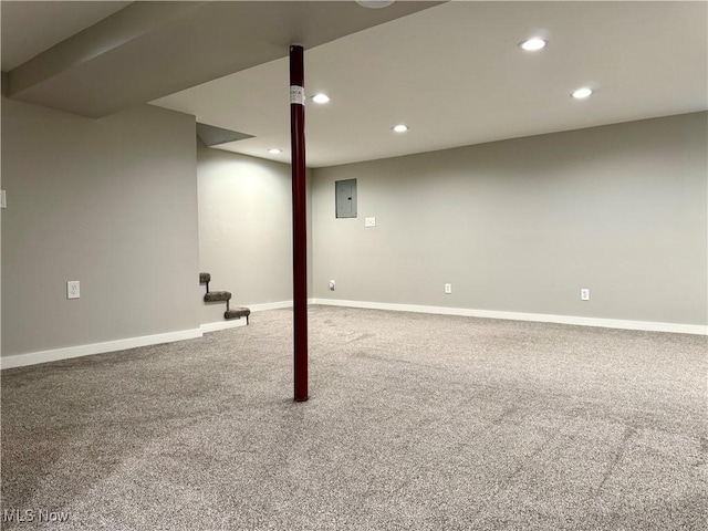 finished below grade area with recessed lighting, carpet, and baseboards
