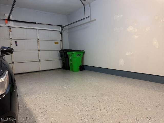 garage featuring baseboards